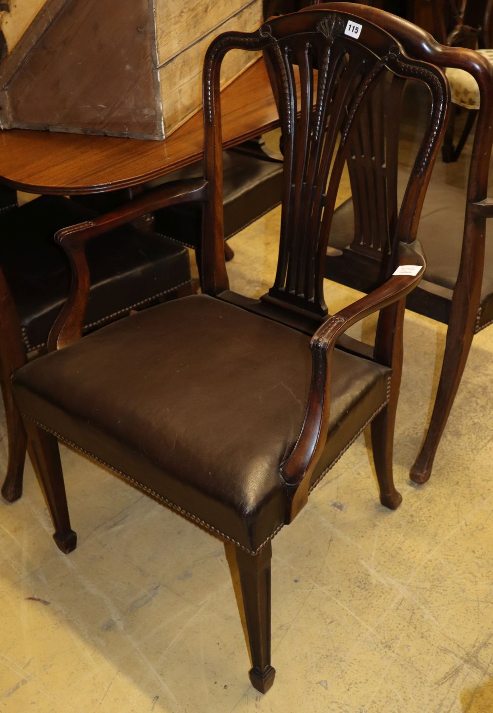 A set of six Hepplewhite design mahogany dining chairs (two arm, four single) carvers W.62cm